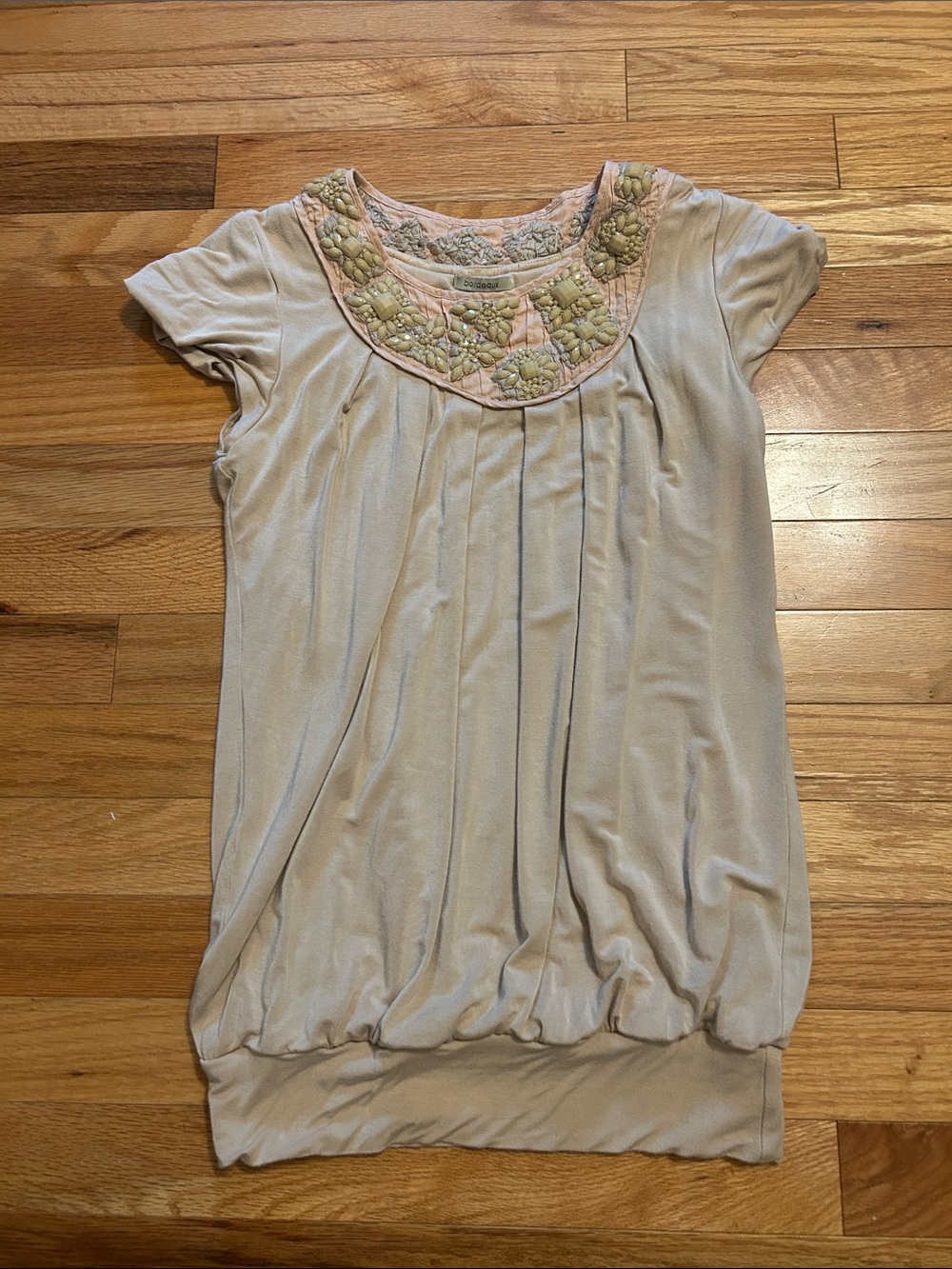 Anthropologie Bordeaux beaded top. Light beige color, size small. Embellished